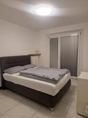 Ein Bett oder Betten in einem Zimmer der Unterkunft Hanin 11
