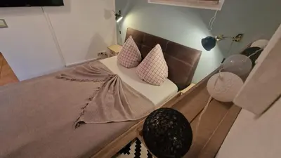 Ein Bett oder Betten in einem Zimmer der Unterkunft FeWo Stephanskirchen
