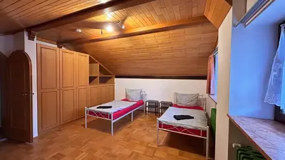 Ein Bett oder Betten in einem Zimmer der Unterkunft Monteurwohnung Vicy mit Gartenblick