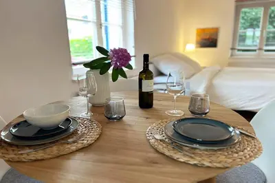 Ein Bett oder Betten in einem Zimmer der Unterkunft Seeloft Seeshaupt - Loft-Appartement am Starnberger See
