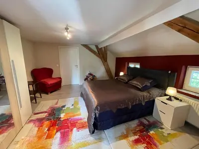 Ein Bett oder Betten in einem Zimmer der Unterkunft Loftartiges Wohnen mit 4 separaten Schlafbereichen