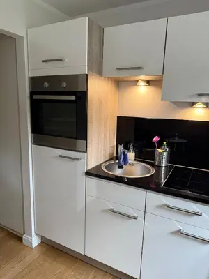 Küche/Küchenzeile in der Unterkunft Stylish Garden Apartment in Central Munich