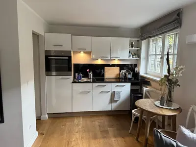 Küche/Küchenzeile in der Unterkunft Stylish Garden Apartment in Central Munich