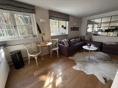 Ein Sitzbereich in der Unterkunft Stylish Garden Apartment in Central Munich