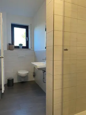 Ein Badezimmer in der Unterkunft Großzügige individuelle Wohnung am Starnberger See