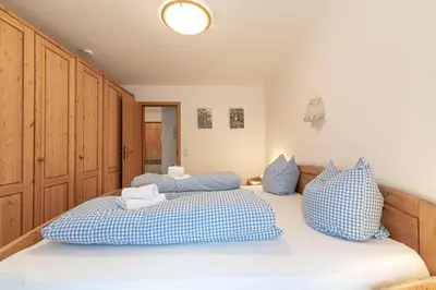 Ein Bett oder Betten in einem Zimmer der Unterkunft Fewo Bergzauber
