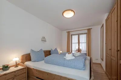 Ein Bett oder Betten in einem Zimmer der Unterkunft Fewo Bergzauber