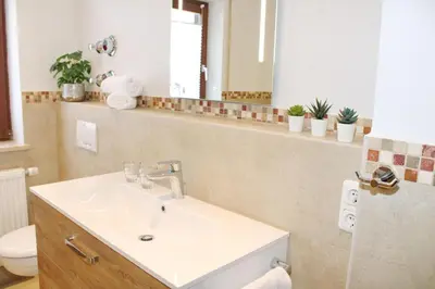 Ein Badezimmer in der Unterkunft See & Bergliebe