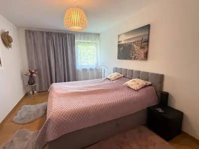 Ein Bett oder Betten in einem Zimmer der Unterkunft FerienNest Traunreut