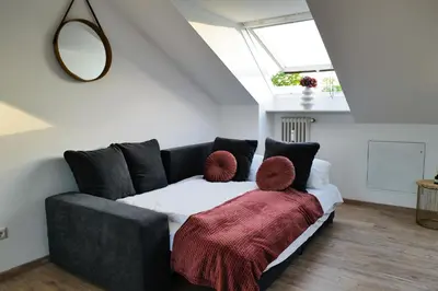 Ein Bett oder Betten in einem Zimmer der Unterkunft ThermenNest Erding, parking, wifi