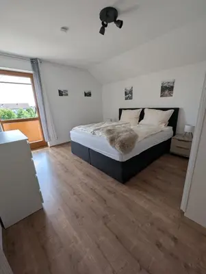 Ein Bett oder Betten in einem Zimmer der Unterkunft Gemütlich wohnen mit toller Aussicht
