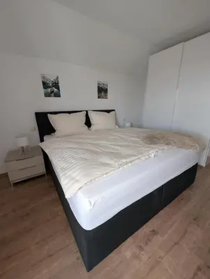 Ein Bett oder Betten in einem Zimmer der Unterkunft Gemütlich wohnen mit toller Aussicht