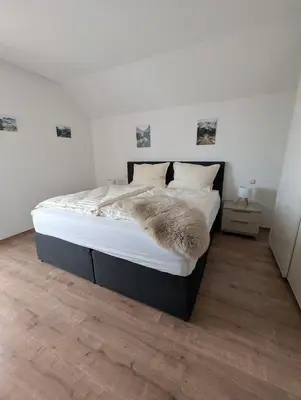 Ein Bett oder Betten in einem Zimmer der Unterkunft Gemütlich wohnen mit toller Aussicht