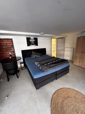 Ein Bett oder Betten in einem Zimmer der Unterkunft Stadt Apartments Bade