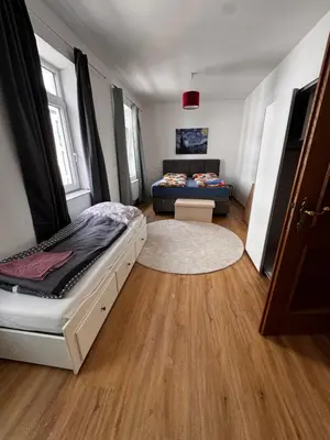 Ein Bett oder Betten in einem Zimmer der Unterkunft Stadt Apartments Bade