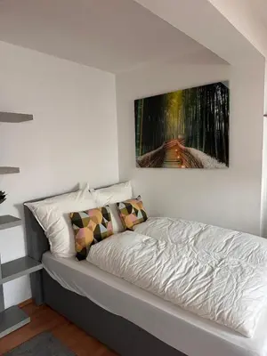 Ein Bett oder Betten in einem Zimmer der Unterkunft Zentral gelegene Wohnung