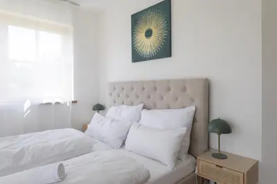 Ein Bett oder Betten in einem Zimmer der Unterkunft Idyllische Ferienunterkunft in Aidling am Riegsee