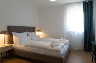 Ein Bett oder Betten in einem Zimmer der Unterkunft Idyllische Ferienunterkunft in Aidling am Riegsee