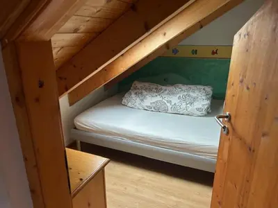 Ein Bett oder Betten in einem Zimmer der Unterkunft Unterkunft in Anzing - DG - 90 qm