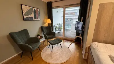 Ein Sitzbereich in der Unterkunft DUTTI'S HOME - Stylisches Apartment, Stellplatz, Küche, Self Check-in