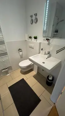 Ein Badezimmer in der Unterkunft DUTTI'S HOME - Stylisches Apartment, Stellplatz, Küche, Self Check-in