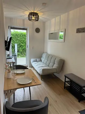 Ein Sitzbereich in der Unterkunft Ferienwohnung Osternach