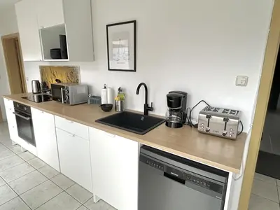 Küche/Küchenzeile in der Unterkunft LTA Apartment Ingolstadt Irgertsheim-5 Schlafzimmer-Einzelbetten-WLAN-Waschmaschine