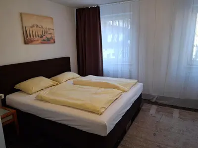 Ein Bett oder Betten in einem Zimmer der Unterkunft Finest Apartment near BMW