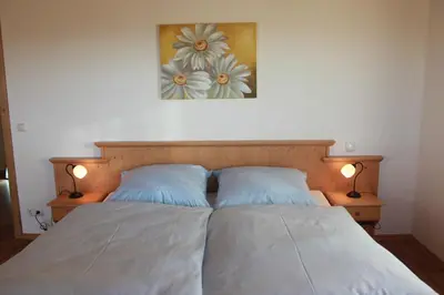 Ein Bett oder Betten in einem Zimmer der Unterkunft Urlaubshof Grimm