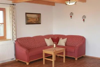 Ein Sitzbereich in der Unterkunft Urlaubshof Grimm