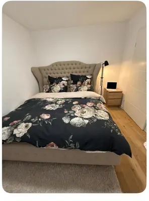 Ein Bett oder Betten in einem Zimmer der Unterkunft Exklusive room in Starnberg lake