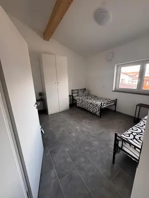 Ein Bett oder Betten in einem Zimmer der Unterkunft Steinhöring Bade Appartements