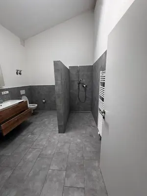 Ein Bett oder Betten in einem Zimmer der Unterkunft Steinhöring Bade Appartements