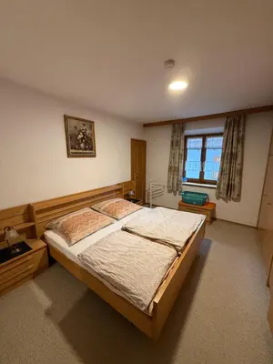 Ein Bett oder Betten in einem Zimmer der Unterkunft FeWo Reiter - Gemütliche Fewo mit bayerischem Flair