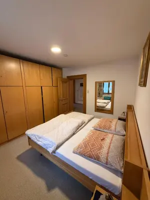 Ein Bett oder Betten in einem Zimmer der Unterkunft FeWo Reiter - Gemütliche Fewo mit bayerischem Flair