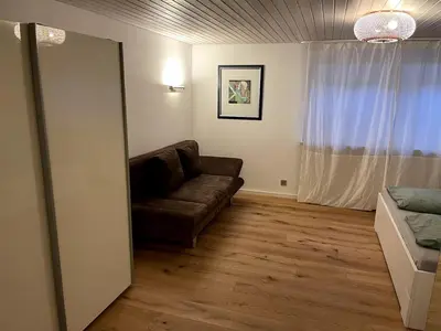 Ein Sitzbereich in der Unterkunft Ferienwohnung in Unterwössen