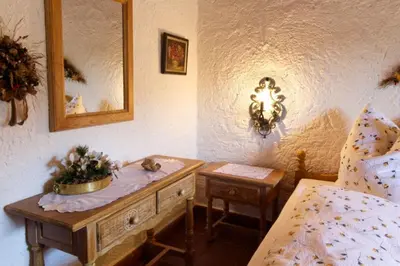 Ein Bett oder Betten in einem Zimmer der Unterkunft Hölzlhaus -563-