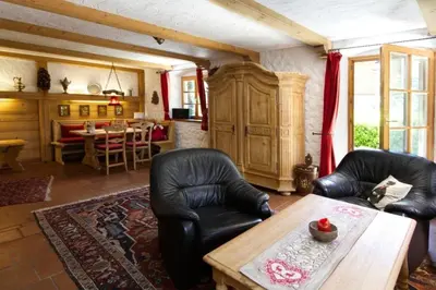 Ein Sitzbereich in der Unterkunft Hölzlhaus -563-