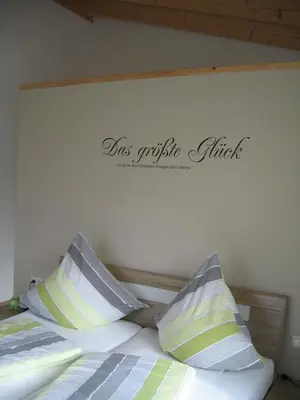 Ein Bett oder Betten in einem Zimmer der Unterkunft Ferienhaus Staudensonne