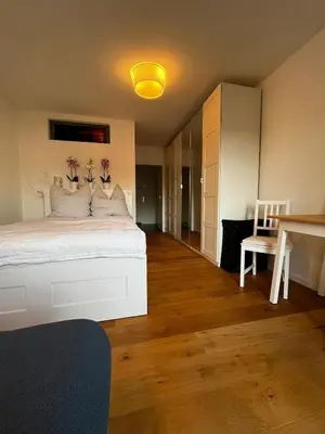 Ein Bett oder Betten in einem Zimmer der Unterkunft NO-Television One bedroom apartment