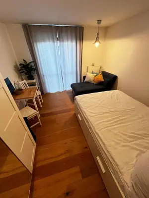 Ein Bett oder Betten in einem Zimmer der Unterkunft NO-Television One bedroom apartment