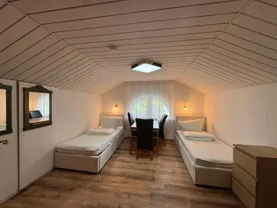 Ein Bett oder Betten in einem Zimmer der Unterkunft GG Self-Stay