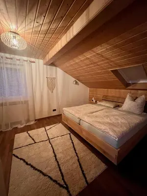 Ein Bett oder Betten in einem Zimmer der Unterkunft Home Sweet Home - Gemütliche Ferienwohnung