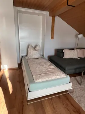 Ein Bett oder Betten in einem Zimmer der Unterkunft Home Sweet Home - Gemütliche Ferienwohnung