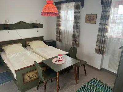 Ein Bett oder Betten in einem Zimmer der Unterkunft Hacker-Alm