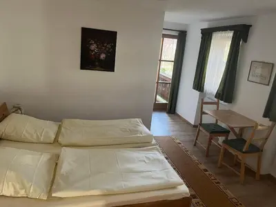 Ein Bett oder Betten in einem Zimmer der Unterkunft Hacker-Alm