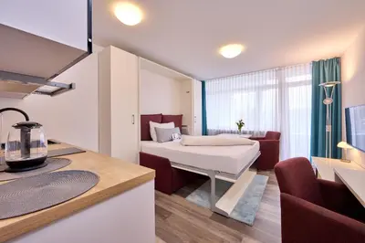 Ein Bett oder Betten in einem Zimmer der Unterkunft Huber Living