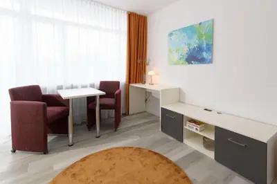 Ein Sitzbereich in der Unterkunft Huber Living