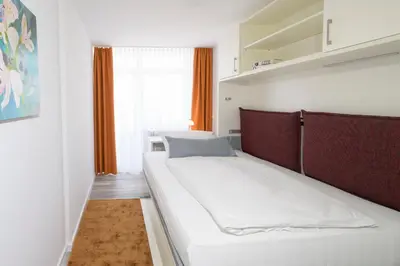 Ein Bett oder Betten in einem Zimmer der Unterkunft Huber Living