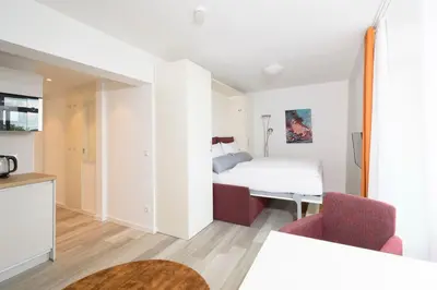 Ein Bett oder Betten in einem Zimmer der Unterkunft Huber Living